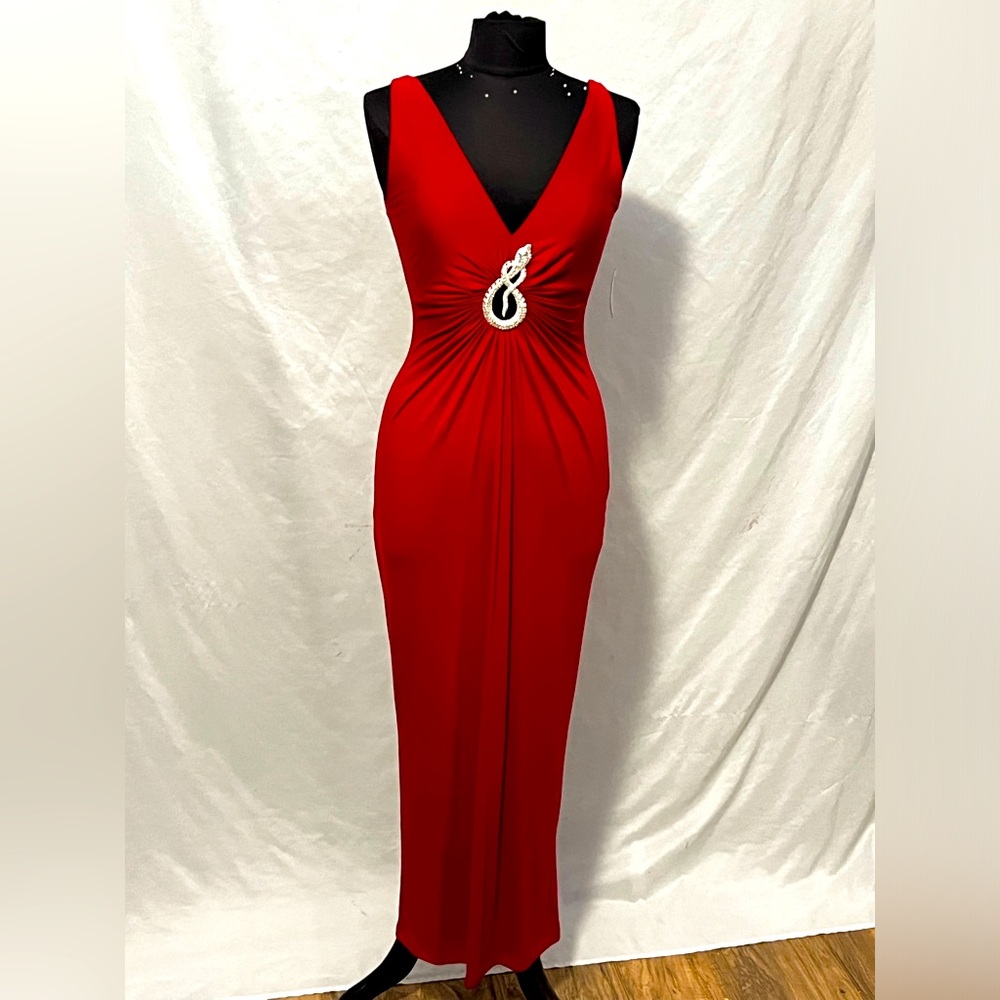 This is a unique, sexy UNIX red snake dress. Exuding passion and strength!